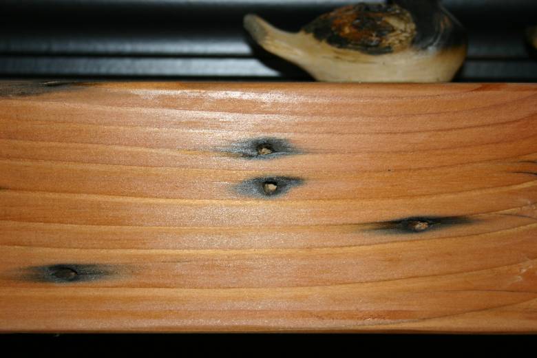 DF Mantel / Closeup of nail holes with staining